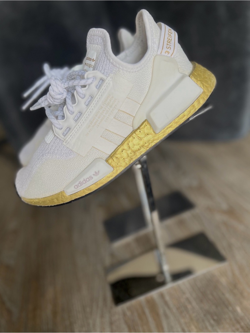 Adidas White Sneakers with Gold Midsole Accent